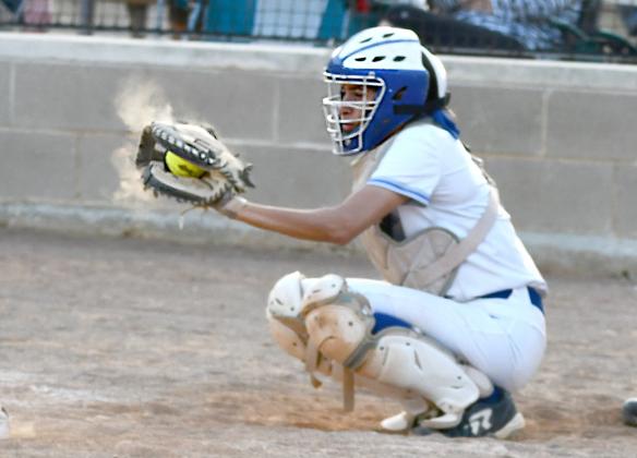 Catcher Nalyzza Rodriguez keeps things quiet at home plate during the Lady Bulldogs game last Thursday. BULLETIN PHOTO/Tracy Thayer
