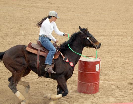 Toni Felps competes during the barrel races hosted last Saturday at Mansfield Park. She went on to win $157. Event organizers say they are planning to schedule more events in the future. BULLETIN PHOTO/Chuck McCollough petes during the barrel races