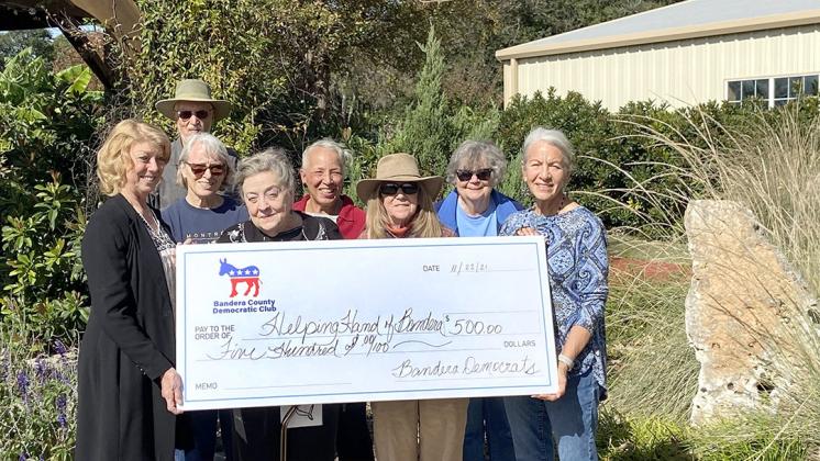 DEMS DONATE TO HELPING HAND