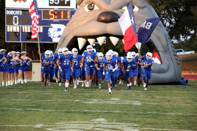 The Bandera Bulldogs charge out onto the field for last Friday’s game against Comfort. Since it was Senior Night, members of the class of 2022 took to the field to pose with family and loved ones. For more photos, visit the Bulletin’s facebook page. B