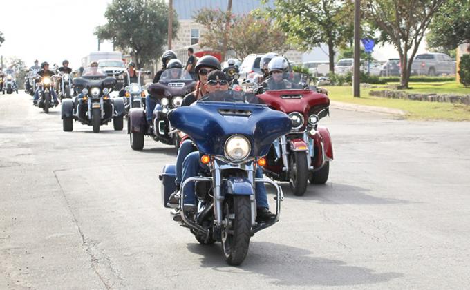 A group of bikers ride out for the start of the 11th Annual Frogs for Freedom, which this year raised a record of $64,000. BULLETIN PHOTO/Chuck McCollough