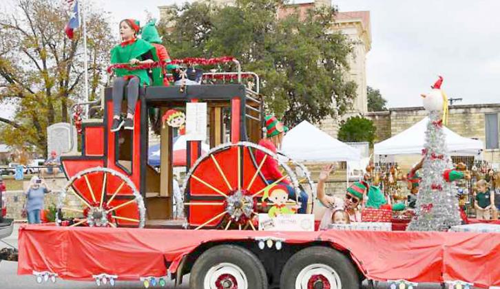 Pioneer RV Park wishes Bandera a Merry Christmas during the Cowboy Christmas Parade last Saturday. BULLETIN PHOTO/Tracy Thayer