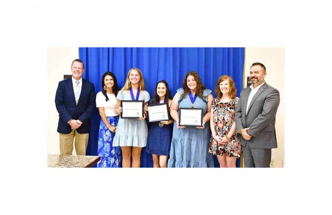 Dr. Jerry Hollingsworth (far left), BISD Board President Brittany HIcks (second from left) and BHS Principal Dr. Kenneth Vogel (far right) recognize the BHS Texas Association of Future Educators team for their recent success at national competition. The t
