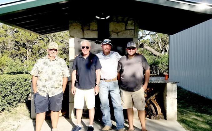 Custom smoker masterminds from left are Jason Clark, John, Tim Gard, and Chad Clark. BULLETIN PHOTO/Cari Golyzniak