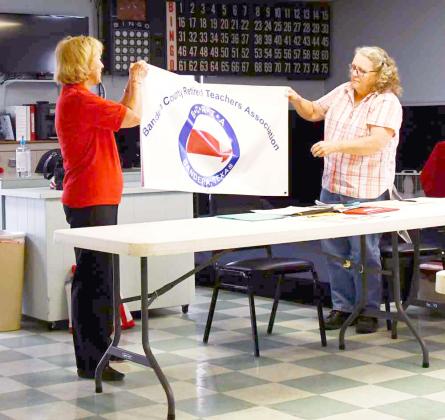 President Connie Young and Secretary Sarah Baxter display BCRTA’s new banner. BULLETIN PHOTO/Tracy Thayer