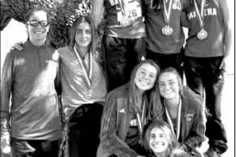Girls’ cross country teams claim titles