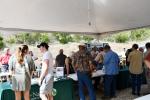Attendees at the Bandera Canyonlands Alliance Meeting and Barbecue stroll among booths from various local environmentalist organizations. BULLETIN PHOTO/Tracy Thayer