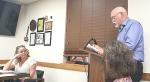 Steve Childers, Administrator for the Flying L PUD, addresses the Bandera City Council as Bandera Mayor Pro Tem Rebeca GIbson listens. Gibson led the meeting in Mayor Suzanne Schauman’s absence. BULLETIN PHOTO/Cari Golyzniak