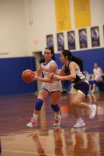 Brooke Mancha drives to the basket during the Lady Bobcats’ opening week to the season. Courtesy Photo 