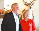 BCRTA President Connie Young welcomes BISD Interim Superintendent Gary Bitzkie to the November meeting at the Dixie Dude Ranch. BULLETIN PHOTO/Tracy Thayer