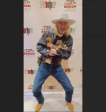 Bandera local Dennis Allyn hoists the three trophies he took home from the 2023 Wild Bunch Film Festival in Oct. 2023. Courtesy photo