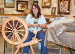 Jennifer Kulick demonstrates wool spinning technique during a spring break presentation at the Frontier Times Museum last week. BULLETIN PHOTO/Tracy Thayer