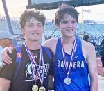From left, Bandera High School senior Tyler Moore and junior Braden Cox pose with their medals after competing in the Regional Track Competition for Region 4 in Kingsville last week. Courtesy Photo